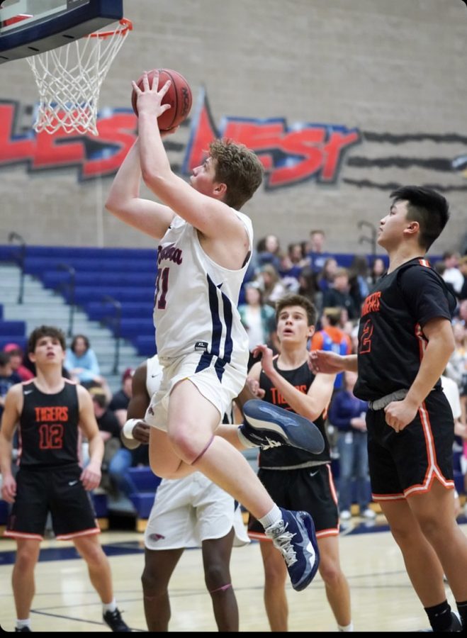 Brayden Rhoades  scores for Dakota Ridge High School.