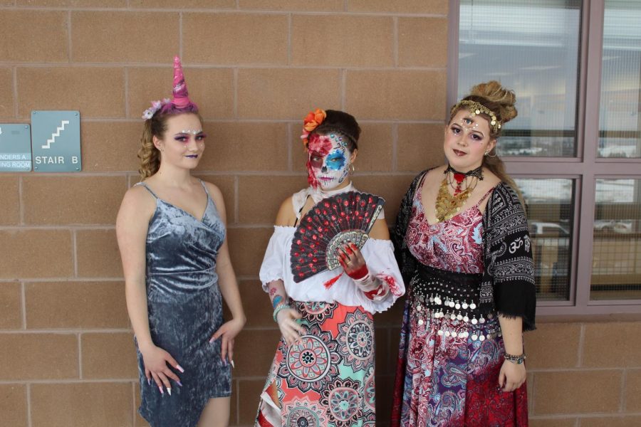 Junior Sophia Tavanello, Kaya Robinson, and Jolie Gastineau prepare themselves to be judged.