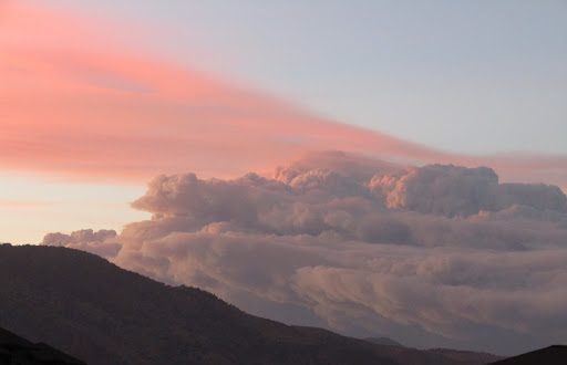 Smoke rising above the mountains in Littleton, Colorado from the recent northern fires. 