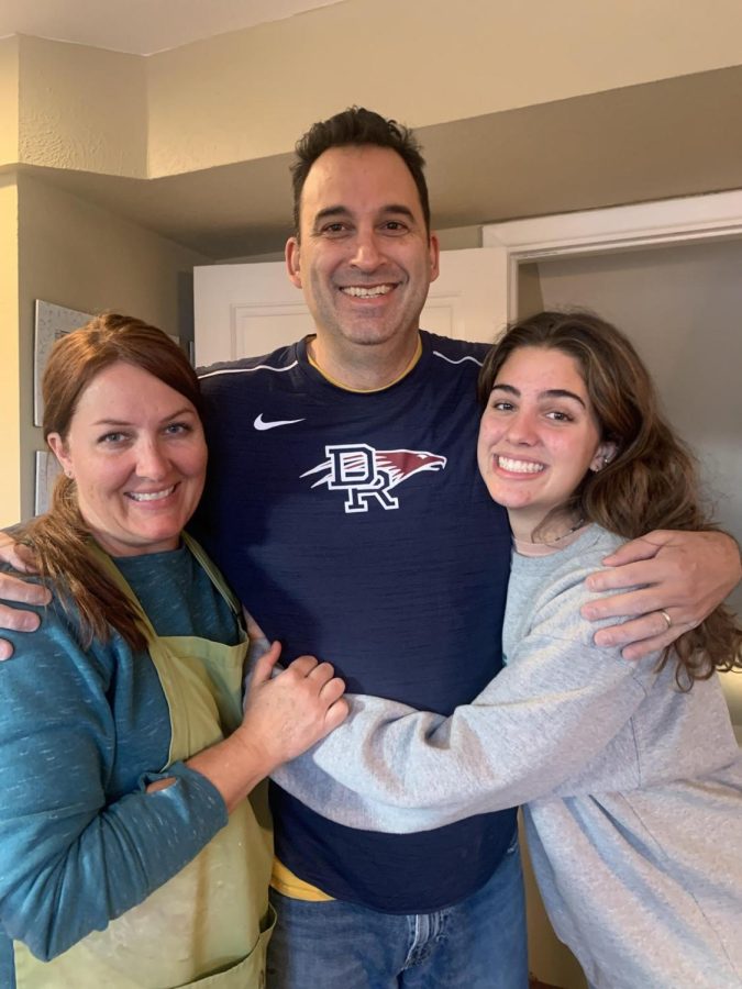 Josie Corridori and her parents, Stephanie and Ed, stop their crazy daily lives for a quick family hug. 