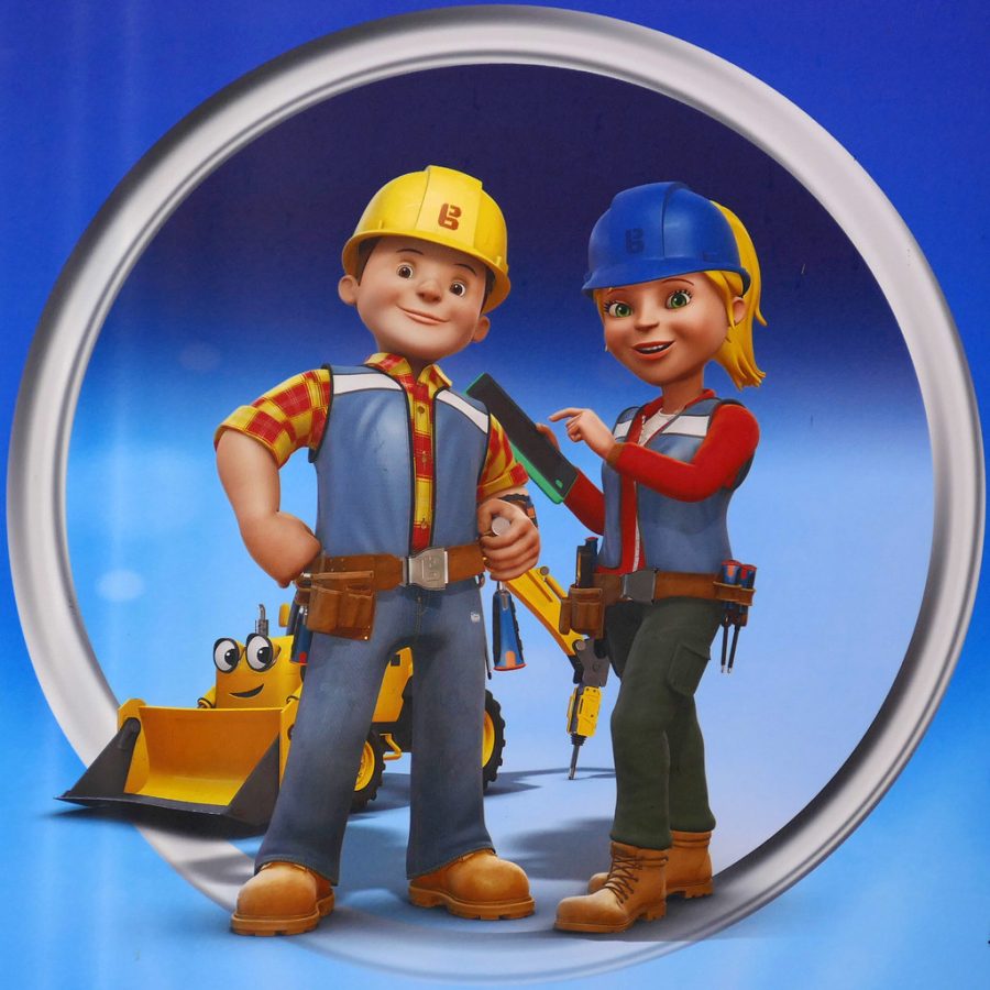 Bob The Builder and Wendy  stand together with Scoop, who is a construction digger.
