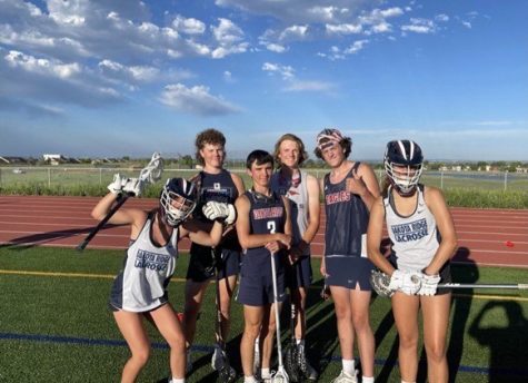The boys and girls lacrosse teams swap uniforms; boys in skirts, the girls in baggy tanks.