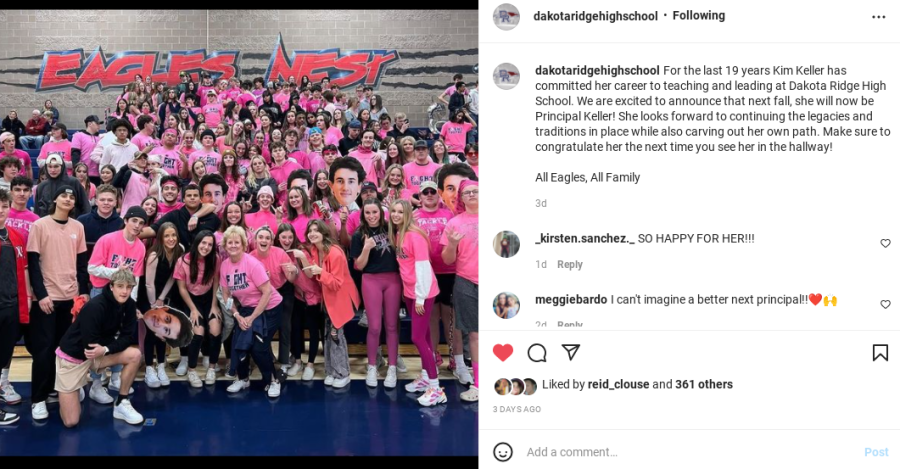 Dakota Ridge Instagram page announces the new principal with a picture of Mrs. Keller in front of a basketball think-pink game student section. 