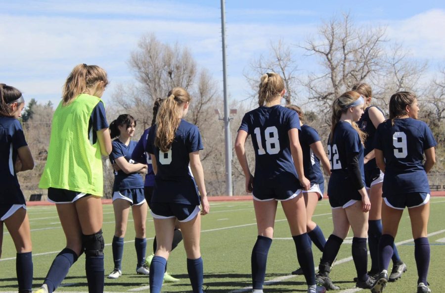 The+Dakota+Ridge+women%E2%80%99s+soccer+team+about+to+huddle+up+for+a+game+against+Chaparral.+