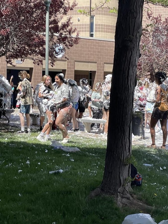 For the final set of festivities before graduation, seniors gathered outside of the school to have a shaving cream war. 