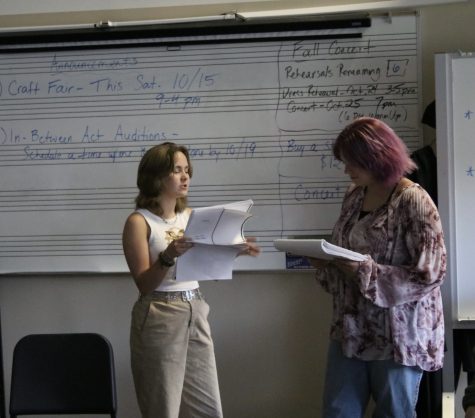 Raven Myers (10), left, and Heidi Squillace (10), right, rehearse in the choir room for Steel Magnolias. 