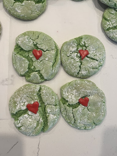 Looking for a fun and simple cookie to bake with family or by yourself? The Grinch Cake Mix Cookies are perfect for you. 