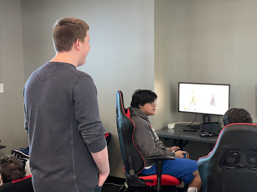 Riley Briggs, Mason Deza and Michael Weber practice Super Smash Brothers at the Peak Community and Wellness Center. 