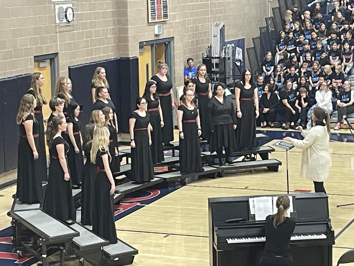 Dakota Ridge Rubies sing “Lampo” by Ryan Main. “There were a lot of great performances at the concert, but Lampo was my favorite,” district registered nurse Amy Doolittle said. “It was impressive that they could sing the entire song in a different language.”
