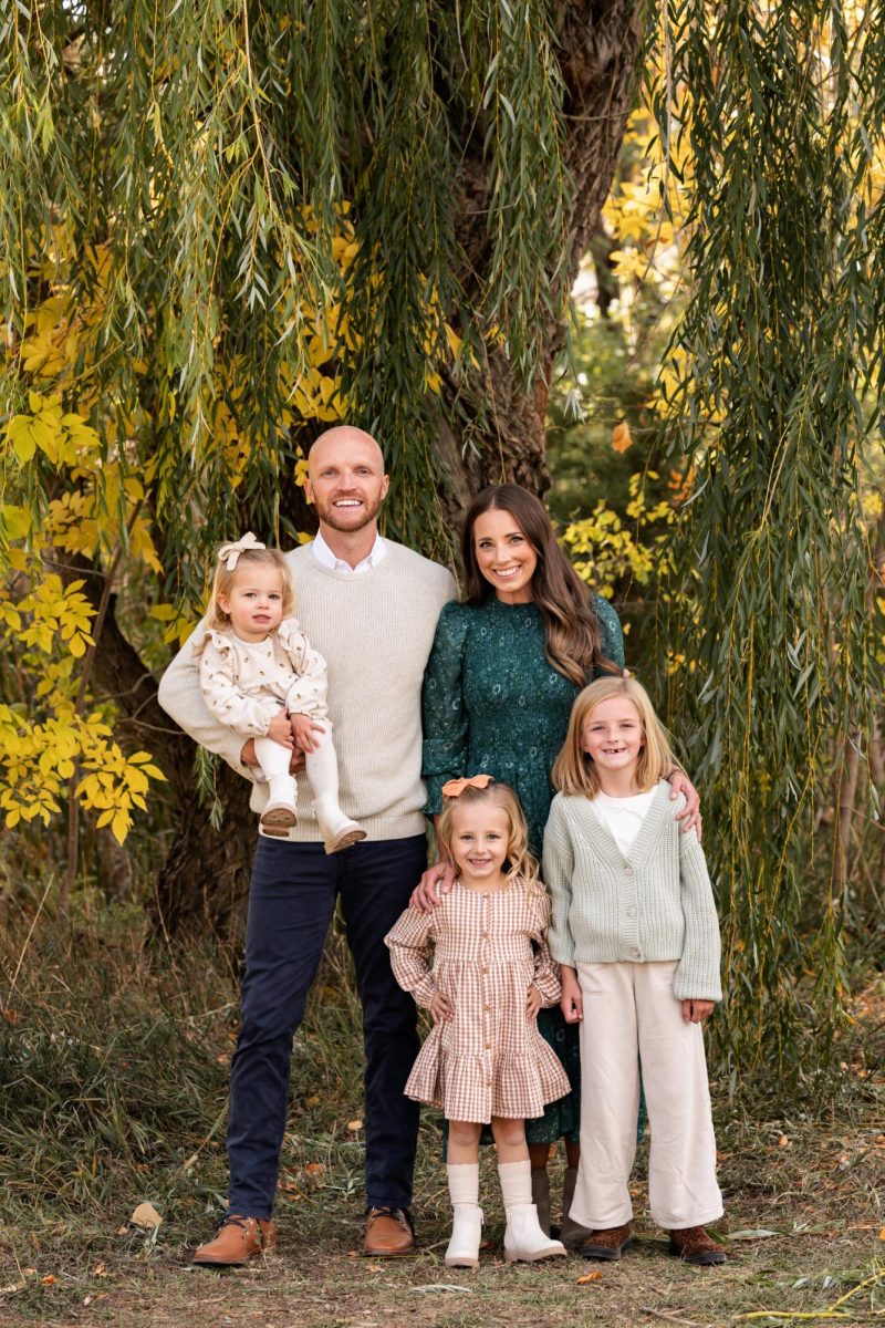 Mr. Dougherty, his three daughters, and his wife during their family photos. Dougherty is at the stage where he “Can’t do no wrong” with his daughters.