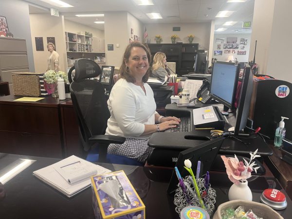 Hastert’s desk is in the middle of the main office and always includes a bowl of sweets on her desk. One of her major responsibilities is sending communications to the DRHS families when necessary.