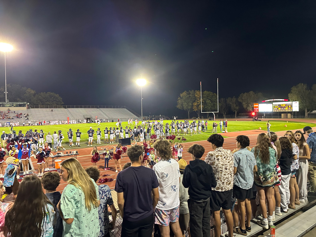 Thursday night lights shined bright at Jeffco Stadium as the Dakota Ridge Eagles faced off against Heritage High School on October 10, 2024, continuing the Eagles' winning streak.  Although the stands weren’t filled with big crowds, the team still pulled out a great win.  “All the work we put in the previous week, the practice and the film, just coming together, it was kind of a personal game for some of the guys,” DRHS senior player Asa Davison (1) said.  “So being able to stand with them and play our best really helped. It was tough, but we ended up shutting them down,”