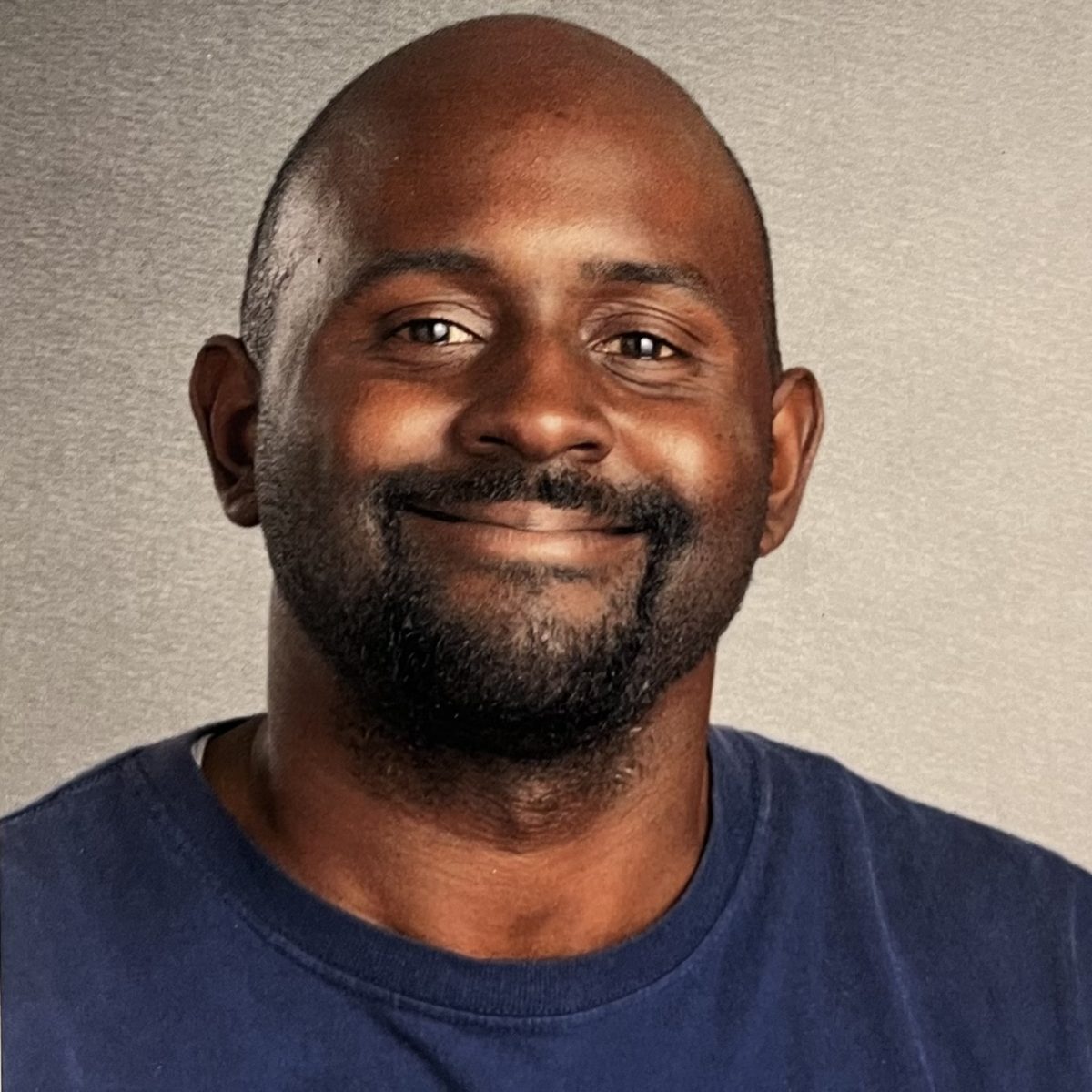 Brandon McDaniel manages a full custodial staff in his role at Dakota Ridge High School.