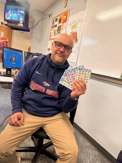 Math teacher Tierre Duran shows off his Seminar Bingo cards ahead of the annual Turkey Bingo event on November 20, 2024.

"It's nice seeing people in my Seminar win!" DRHS junior Kaylee Walls said.
