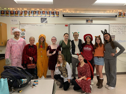 IB Programme students, and teachers Ms. Davis and Mr. Smoker, dressed up as Shrek characters for Halloween. 