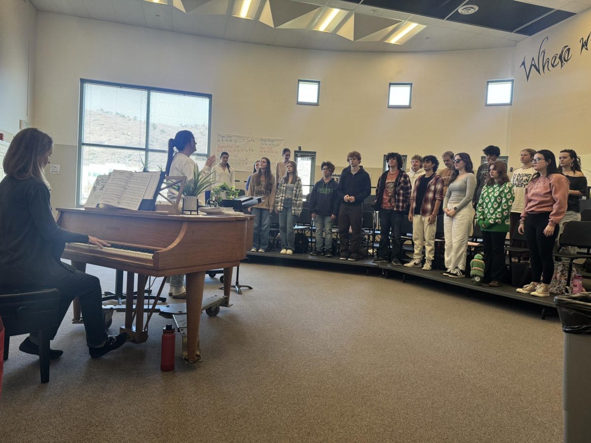 The DRHS choir practices leading up to the Winter Festival that will be held on December 10 and 11 at 6:30 p.m.