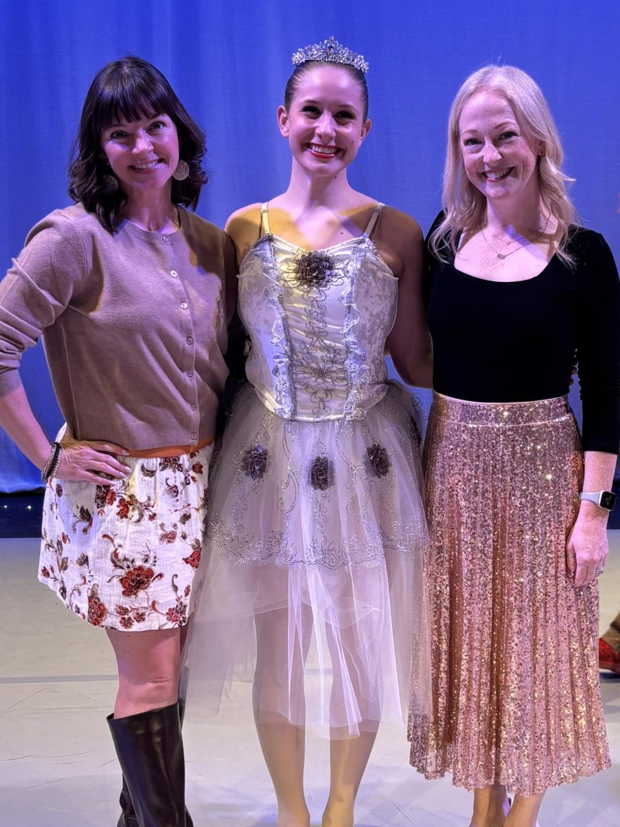 Mary Williams (on left), me (middle) and Anne Gnoth (on right) standing on the Englewood High School stage after the LCDC NutCracker performance, 2024.
