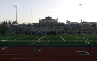 Senior Recognition at the Littleton Champ meet on April 7, 2025. All the seniors from participating schools stood in the center of the field and got their names called for a moment of recognition.   
